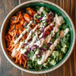 A fully loaded and vibrant chipotle chicken fresh mex bowl showcasing fresh ingredients.